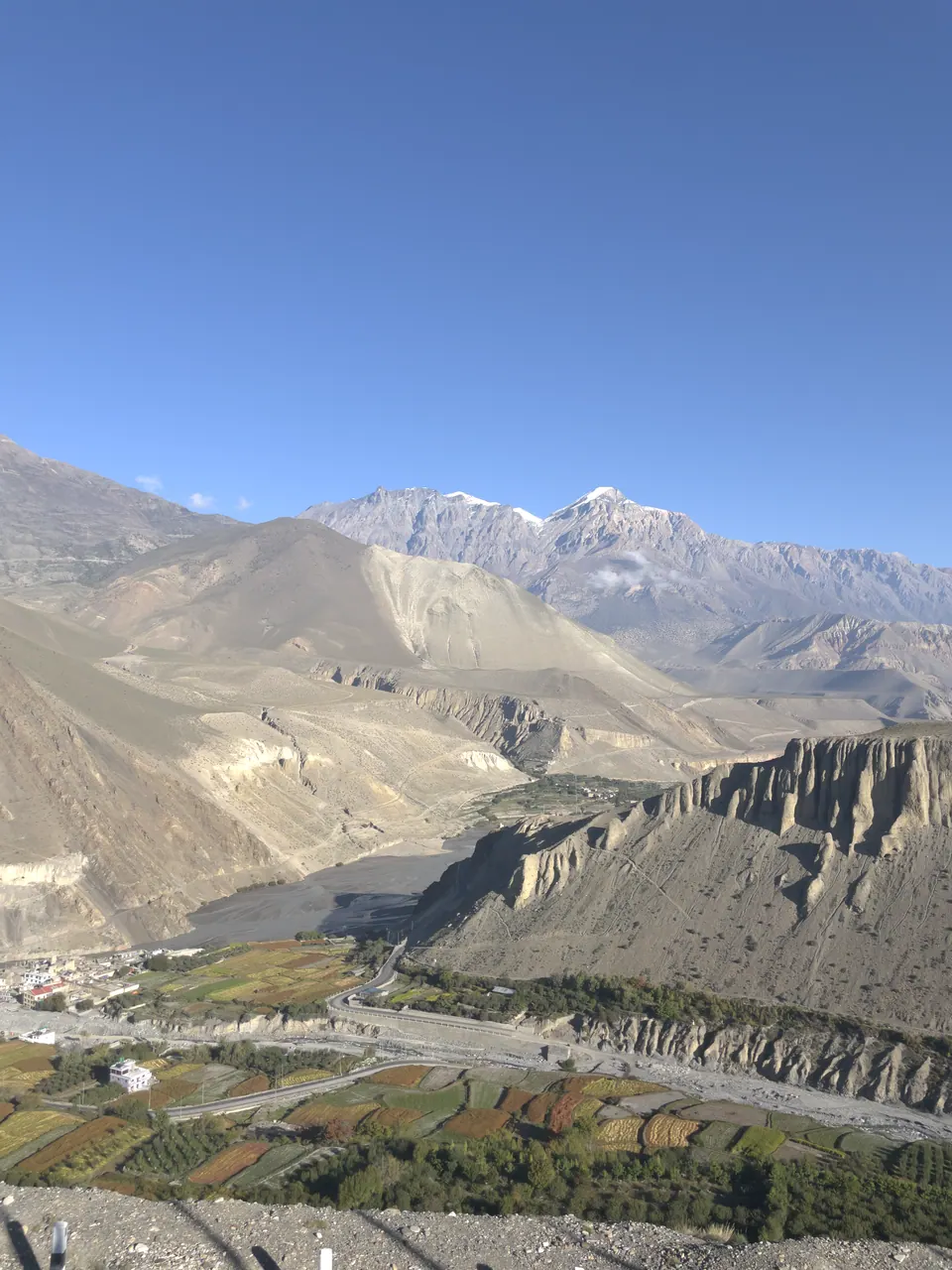 A mountain settlement among dry high-altitude ridges.