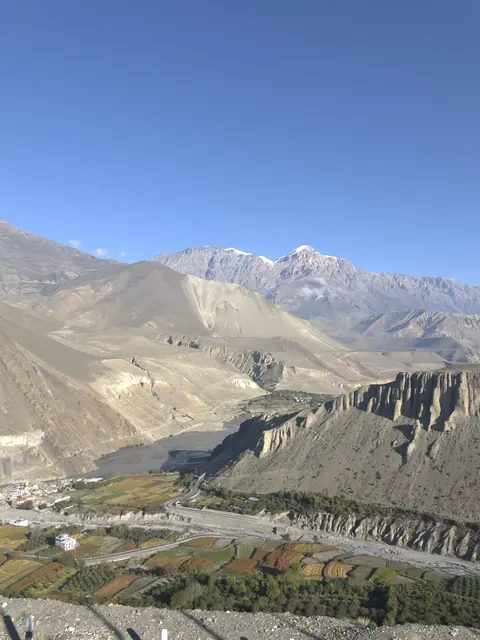A mountain settlement among dry high-altitude ridges.